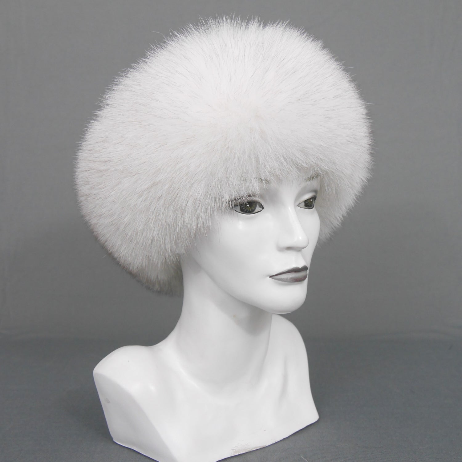 Blue fox fur headband on mannequin